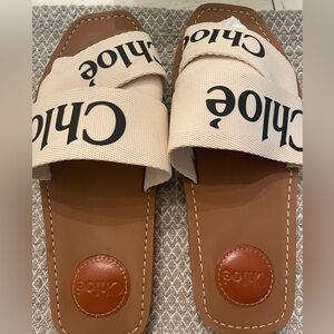 Chloe Woody Logo Slide Sandal.